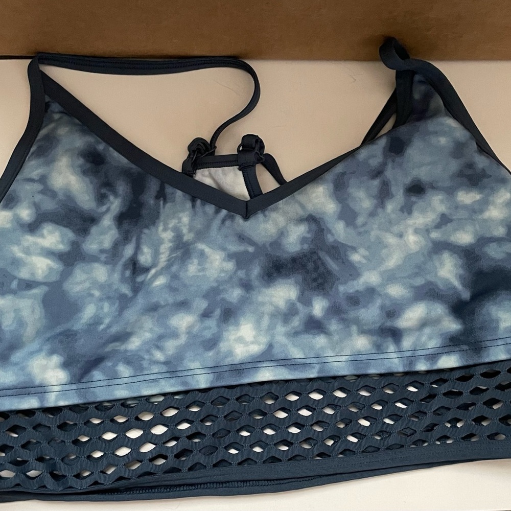 Pink Victoria’s Secret sports bra in good condition size large